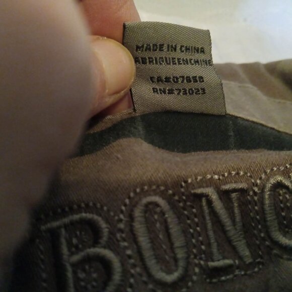 Military-style camouflage chic jacket with asymmetrical pockets and patches - Picture 7 of 9